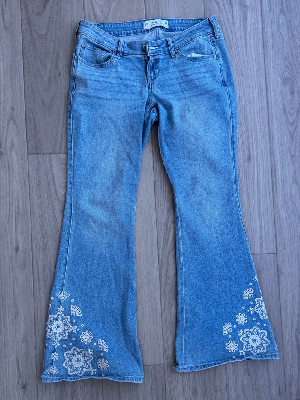 Hollister Light Blue Flare Jeans with White Floral Embroidered Hem
